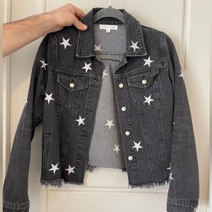 Black denim jacket with embroidered stars